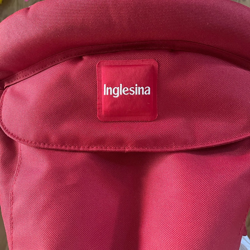 Inglesina red clip-on highchair